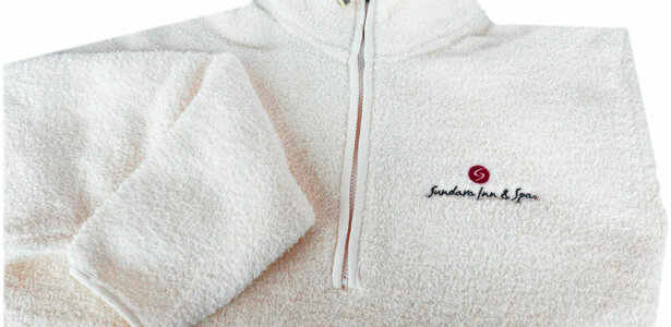 sundara white fleece jacket with logo