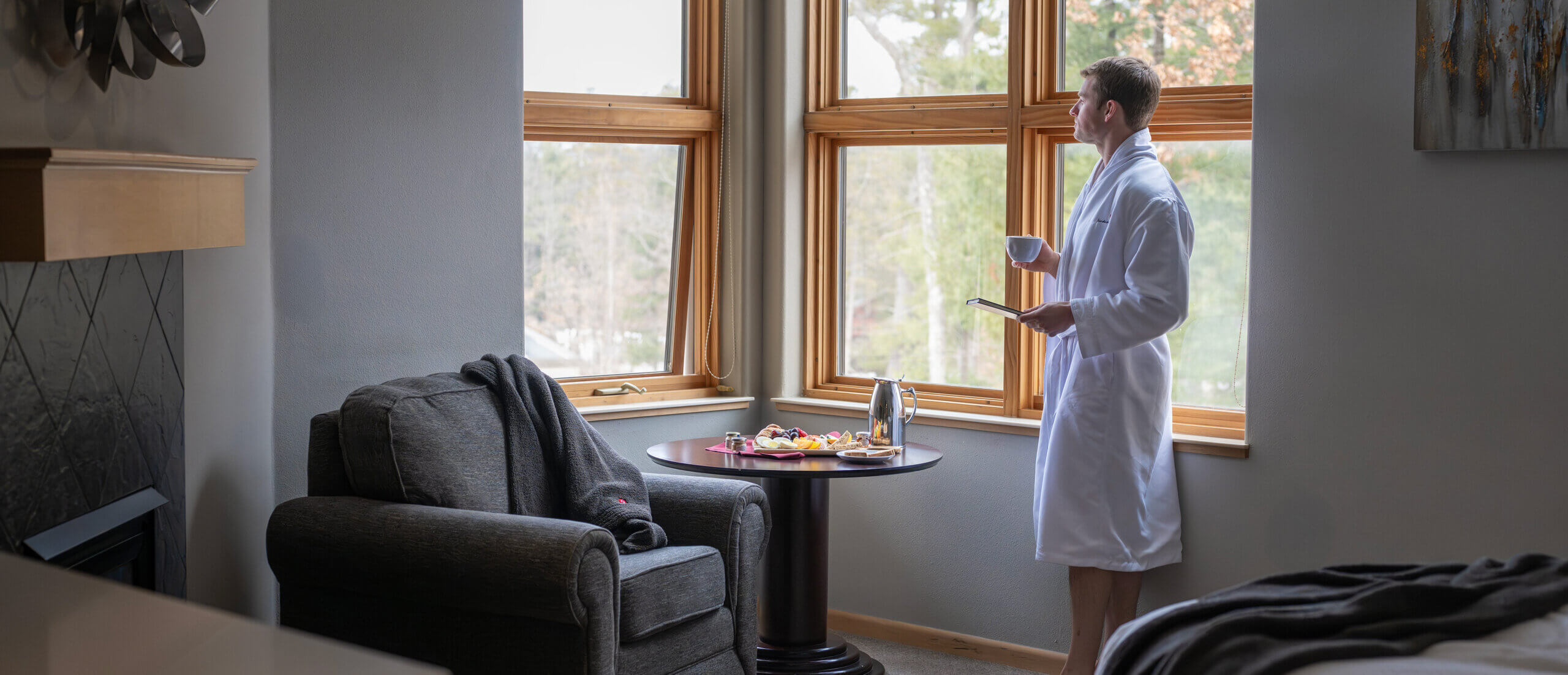 Male enjoying coffee in his suite